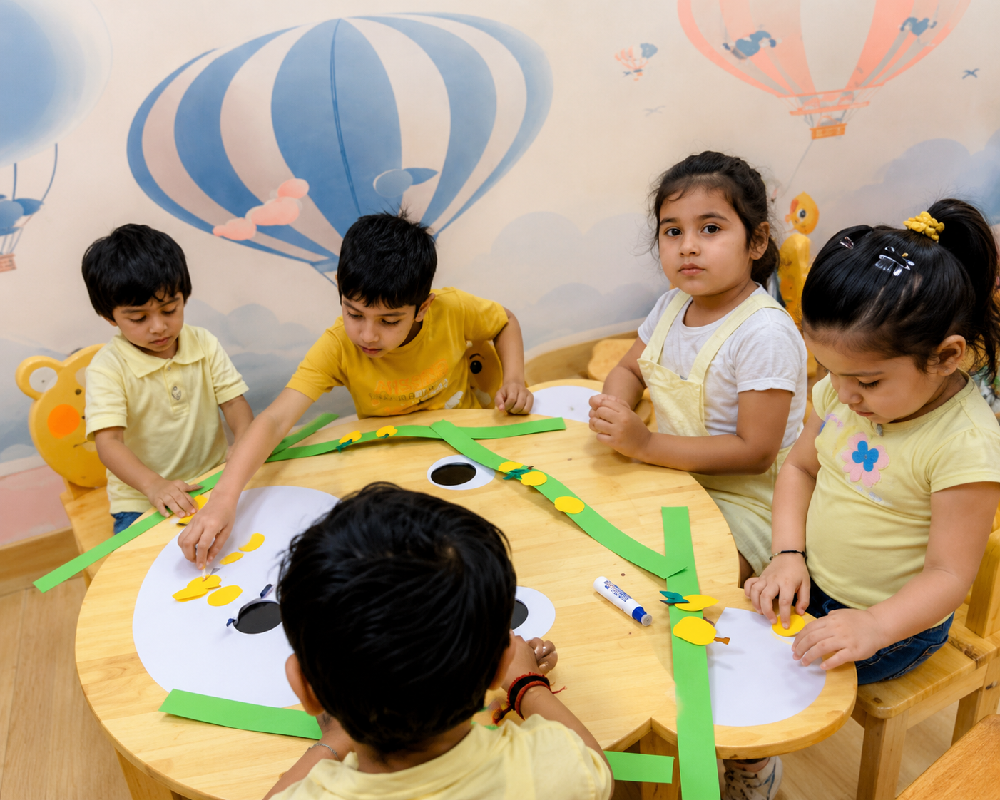 Children doing craft at Cambridge Montessori Shalimar Bagh